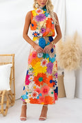 Sommer | Ärmelloses Maxikleid mit Halsband, taillierter Schnitt und floralem Muster