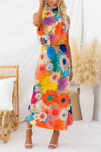Sommer | Ärmelloses Maxikleid mit Halsband, taillierter Schnitt und floralem Muster