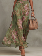 Florenz | Grünes Chiffon-Maxikleid mit floralem Halterdesign